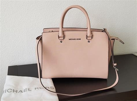 michael kors tasche rosa löcher|michael kors official website.